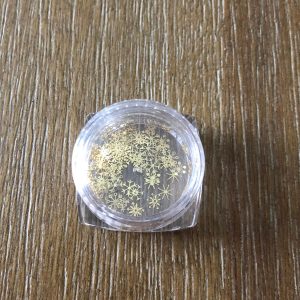 gold snowflake embelishments nail