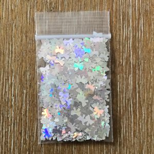128# Holographic bow glitter 1tsp