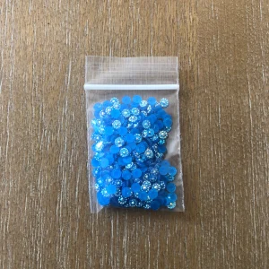 112, 126, and 127# Purple Multi Blue Flatback Sunflower Rhinestones 4mm 1tsp (#112 Purple) - Image 3