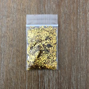115# Gold open heart glitter 1 tsp