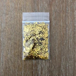 115# Gold open heart glitter 1 tsp