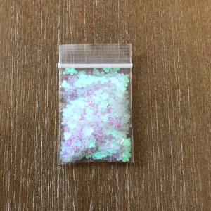 47# Clear translucent iridescent Mickey glitter 1tsp