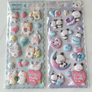 A144-A145 Marshmallow Seal Puffy sticker sheet with gem embellishments (Left - Blue A145)