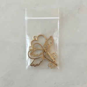 Open bezel heart key pendant