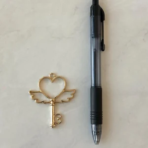Alternative view of Open bezel heart key pendant