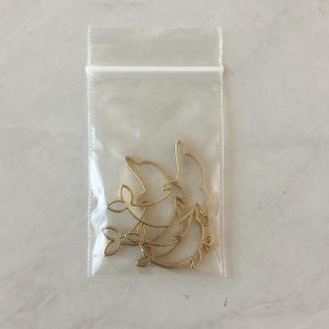 Open bezel dolphins pendant