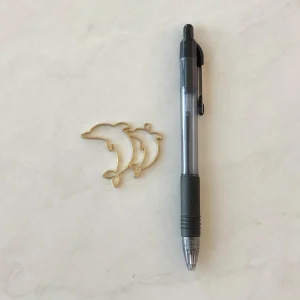 Alternative view of Open bezel dolphins pendant