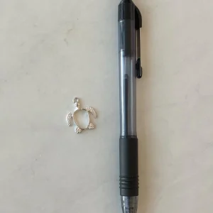 Alternative view of Open bezel silver turtle pendant