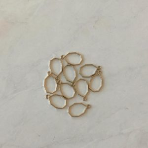 Open bezel geometric pendant